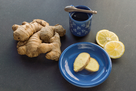 Ginger tea, fresh ginger root, lemonの写真素材