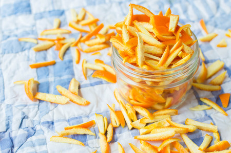 Orange peels in a glass jarの写真素材