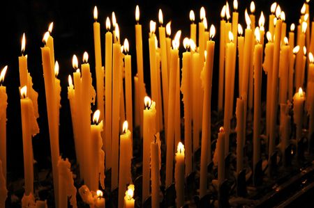 Candles from cathedral in Milan in Italyの写真素材