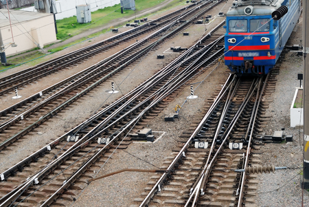 Freight train moving along the railway stationの写真素材