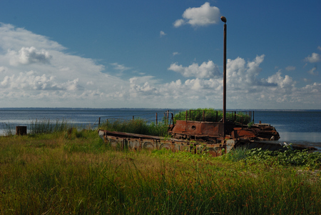 Old pier for small boats in the sea bayの写真素材