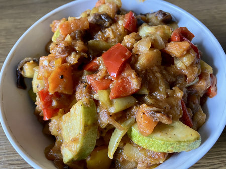 Delicious Georgian Ajapsandali: vibrant vegetable stew with eggplant, peppers, and herbs.の写真素材