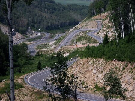A winding road in the mountains. Travel, tourism.