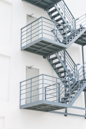 Metal staircase outside of buildingの写真素材