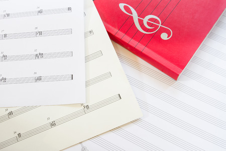 Sheet music and music book with g clefの写真素材