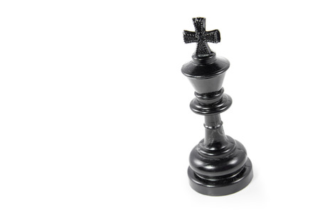 Black chess king isolated on white backgroundの写真素材