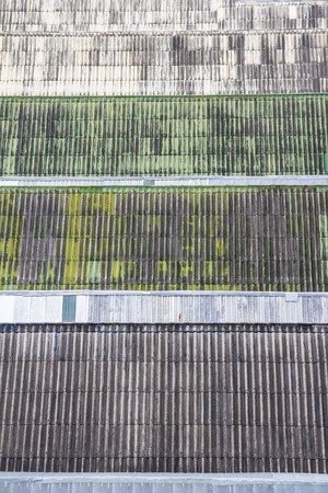 Top view of multiple old roofs tilesの写真素材