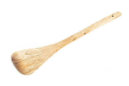 wooden spade of frying pan isolated on white backgroundの写真素材