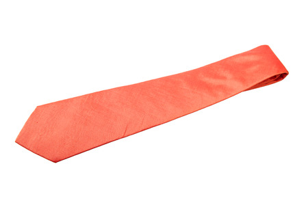 plain orange business neck tie isolated on white backgroundの写真素材