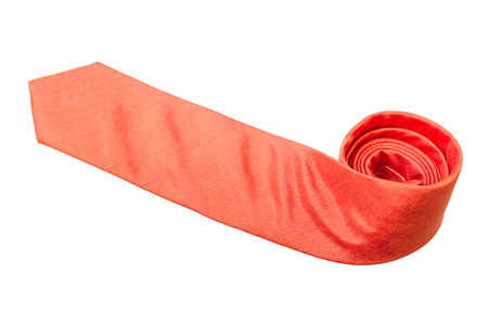 plain orange business neck tie isolated on white backgroundの写真素材