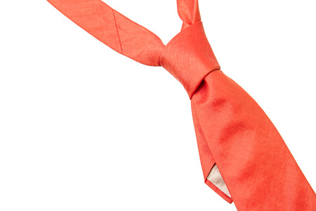 plain orange business neck tie isolated on white backgroundの写真素材