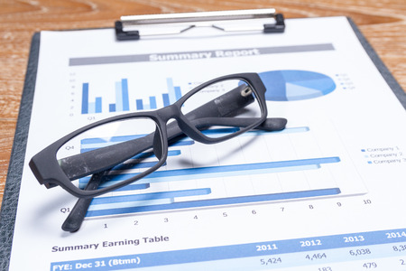 business report on table, business performance concept