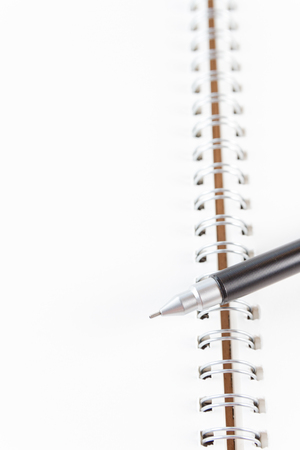 notebook and pencil on wooden backgroundの写真素材