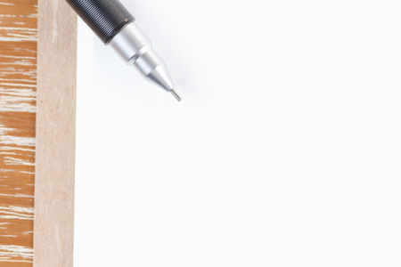 notebook and pencil on wooden backgroundの写真素材