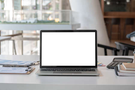 modern office workspace desk with blank screen laptop computer and office supplies. - business workplace conceptの写真素材