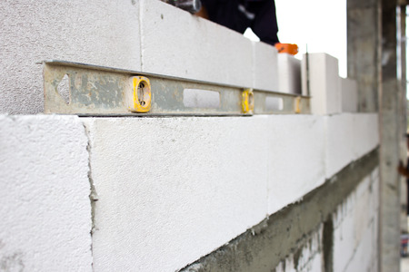 Masonry building and Construction Site