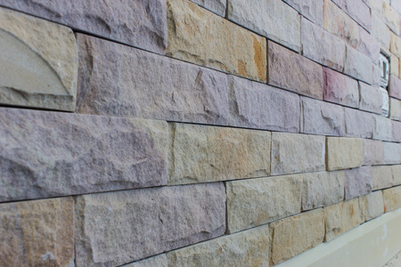 The walls are decorated with sandstone material