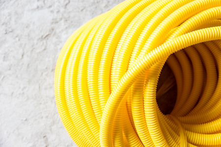Flexible hose yellow protective wire constructionの写真素材