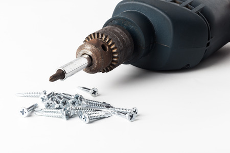 Driller dowel and screw isolated on white backgroundの写真素材