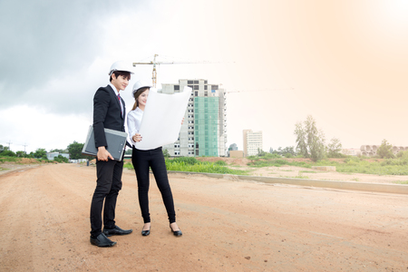 asian construction business working in site looking plan.の写真素材