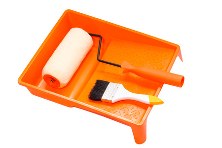 closeup painting roller tools work paint on white backgroundの写真素材