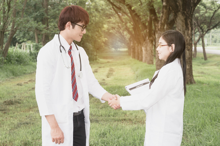 People research studying nature and with notebookの写真素材