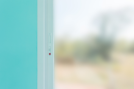The interior of a blue color room with aluminium window railing in constructionの写真素材