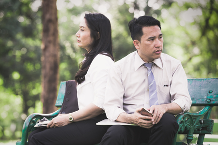 Asian business couple angry in the park,Business couple conceptの写真素材