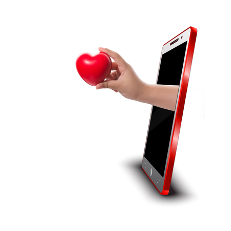 Hand holding RED heart rubber out of screen smartphone 3D,Love conceptの写真素材