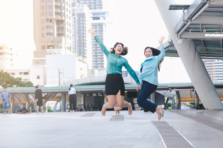 Lifestyle asian business woman happy working outdoor in cityの写真素材