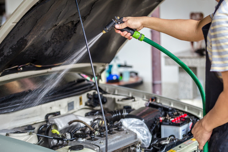 Car washing cleaning engine,Cleaning car using high pressure waterの写真素材