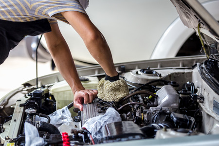 Car washing cleaning engine,Cleaning car using microfiber gloveの写真素材