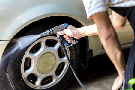 Car washing cleaning,Cleaning car using high pressure waterの写真素材