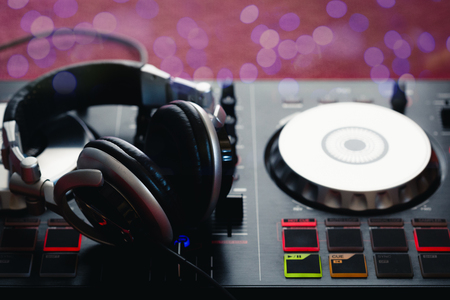 DJ to mix & play music on Turntable vinyl record playerの写真素材