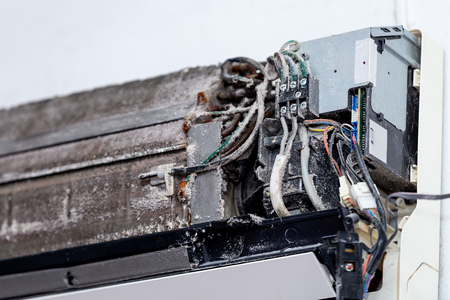 dirty air conditioner in homeの写真素材