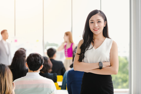 Portrait beautiful asian businesswomen standing looking at camera in officeの写真素材