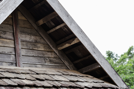 Architecture classic old wooden roof cracked in natureの写真素材