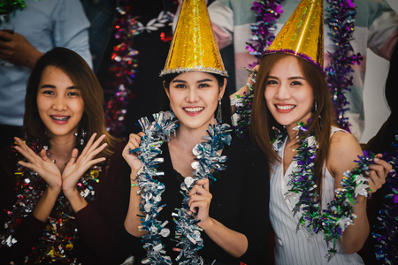 Cheerful young girl people group party conceptの写真素材