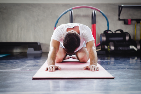Asian young men lifestyle healthy body workout in gym, Sports style yoga conceptの写真素材