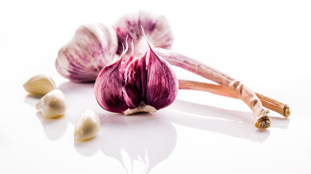Garlic cloves on white backgroundの写真素材