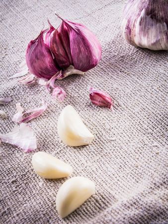 Garlic over rustic backgroundの写真素材