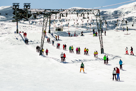 People using rope tow systems of Kaprun ski region in Austriaの写真素材