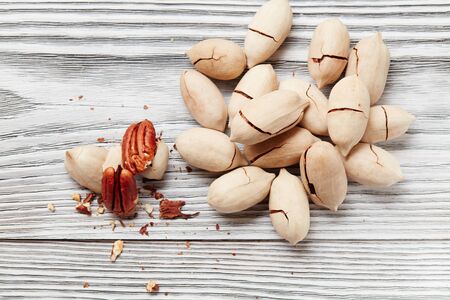 Pecans on a wooden table