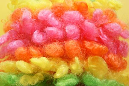 close-up on colored curly clown wigの写真素材