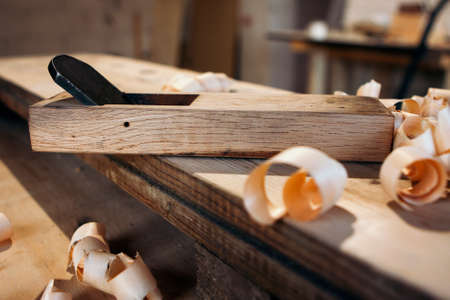 Japanese plane tool on workbenchの写真素材