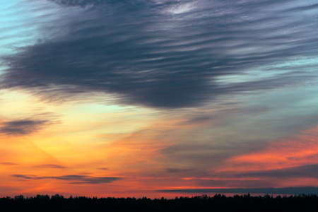 Colorful sunset skies over horizon