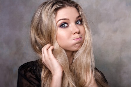 Attractive young girl posing in the studio.の写真素材