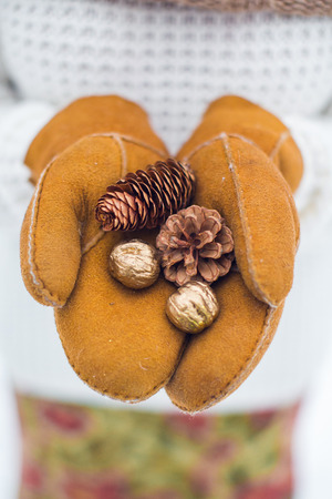 Cozy mood of Christmas and New Year. A girl is in a sweater and a hat.の写真素材