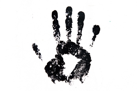 Black hand print on the white surfaceの写真素材
