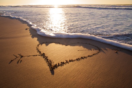 Heard drawn in the sand on the atlantic coastの写真素材